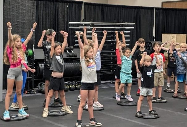 kids raise hands